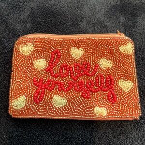 Love Yourself pink pouch